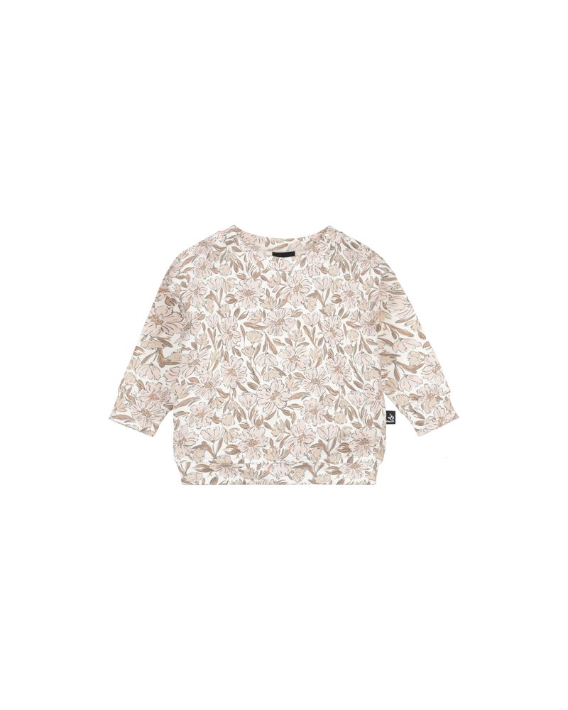 Loose fit sweater blooms peach pink